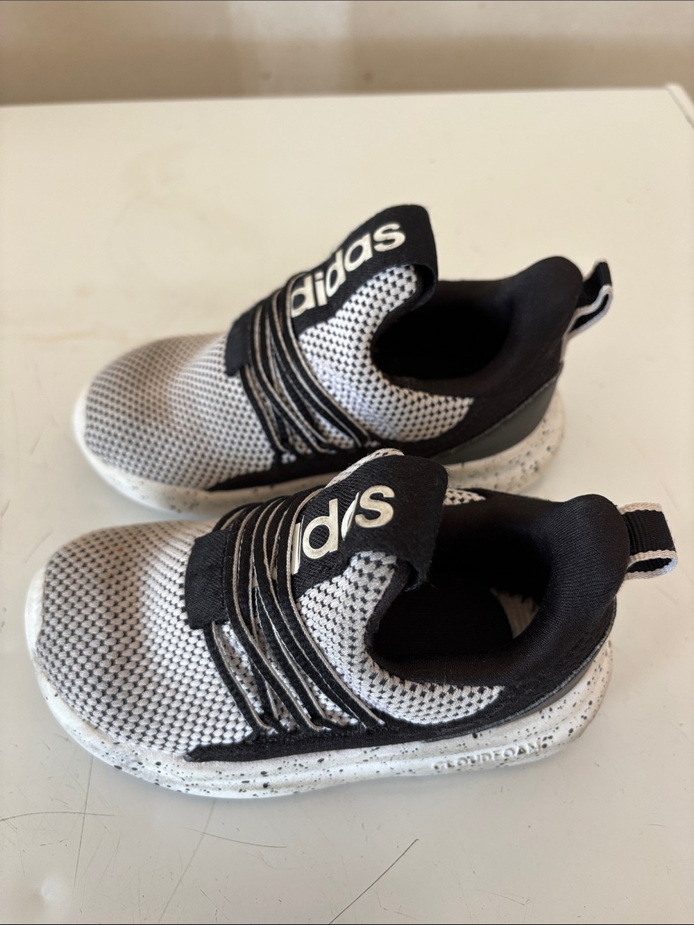 adidas Kids Black and White Slip-On Knit Sneakers